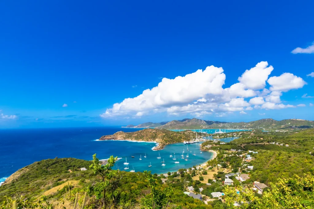 The iconic view from Shirley's Heights, Antigua looking down over English Harbour, Nelson's Dockyard marina and the open Caribbean Sea
